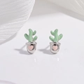 Macro shot of silver cactus stud earrings with green enamel and pink heart pot detail - Pink Heart Strawberry Earrings