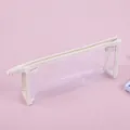 Minimalist transparent PVC pencil case with cream leather edges and zipper closure - White