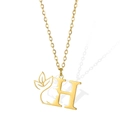 Gold letter H necklace featuring artistic female side profile and leaf pendant design - Letter H