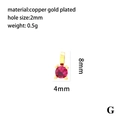 Macro detail of 8mm round red zircon pendant with 18K gold plated copper setting - Round Pendant-G / Rose Red Zirconia