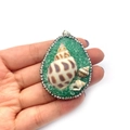 Handmade teardrop pendant with green resin stones, seashells, and crystal border - Green