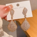Elegant gold drop earrings with geometric diamond shapes and paved sparkling zircons - Gold