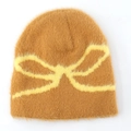 Detail of caramel knit beanie showing fluffy texture and yellow bow jacquard pattern - L(58-62cm) / Yellow