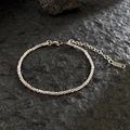 Detail of shimmering 18K gold plated titanium steel chain with lobster clasp and extender - Rippled Rope Chain / Silver