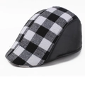 British style checkered newsboy cap with black leather trim and vintage plaid design - One Size 58cm / Faux Leather Trim Black White