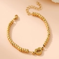 Minimalist 18K gold-plated stainless steel bead bracelet with a stylish central knot design - Rope Knot / Gold