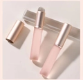 Three portable mini lipstick brushes with frosted pink body and rose gold caps - Portable Silicone Lip Brush Translucent Gray