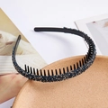 Detailed close-up of non-slip headband with dark blue rhinestones and inner comb teeth - Navy Blue