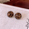 Close-up of retro round leopard print stud earrings with silver beaded metal edges - Silver Brown Large Round Leopard Print (WE4209)