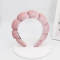 Macro detail of a pink velvet braided headband with soft texture and puffy cloud design - Pink
