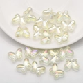 Macro shot of butterfly glass beads with aurora finish for DIY jewelry crafts - Crystal Yellow