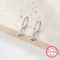 Macro detail of S925 sterling silver hoop earrings with blue stone eye pendant charms - KE22361 Classic Evil Eye Hoop / Silver