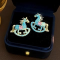 Golden rocking horse earrings with blue pavé stones and a pink crystal center - E7944 Silver Pin-Gold Blue