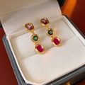 Detailed view of vintage gold earrings with colorful zircon stones in a jewelry box - Gold Plated Multi-color Gemstone (Silver Pin)