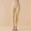 Hoch taillierte Yoga-Hose in Hellgelb mit Rippenmuster aus nahtlosem Stretch-Material - S / Beige