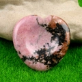 Polished heart-shaped rhodonite worry stone with natural pink and black patterns - Rhodonite