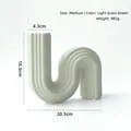 Modern S-shaped ceramic vase in light grass green with vertical ribbed matte texture - S-Shaped Vase-Medium / Light Grass Green