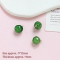 Detail showing green sphere pendants with gold clips and mini leaf charm 9x12mm - Lime Orange