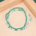 Handmade green and white beaded bracelet set on a minimalist wooden display tray - Style 38-Double Green White