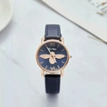 Detail of luxury bee motif watch on marble surface with dark blue leather strap - Navy Blue