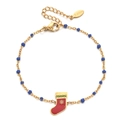 Detail of stainless steel Christmas stocking charm bracelet with festive colorful beads - Blue