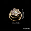 Detailed close-up of a rhinestone flower spiral hair pin with dimensions and weight - 10# Golden Rhinestone Flower