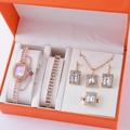 Close-up of rose gold watch and jewelry gift set featuring pink dial and rhinestone detail - Rose Gold Pink Dial Jewelry Set (5)