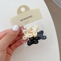 Set of mini bow-shaped hair claws in black and beige with accessories card packaging - Bow Cream Black (Set of 4)