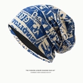 Blue and white newspaper print slouchy beanie hat featuring decorative lettering - Newspaper Print Style / Sapphire Blue