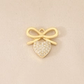 Detailed view of 18K gold bow heart pendant with micro-pave white zircon stones - Pave Heart Bow (PJ0468) / Gold