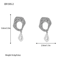 Vintage silver hollow lava earrings with baroque pearls for elegant fashion looks - Silver