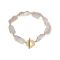 Baroque irregular freshwater pearl bracelet with golden flower OT buckle on white background - Natural White