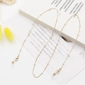 Elegant gold glasses chain with white pearls and anti-slip silicone loops for women - Fine Gold Chain with Faux Pearls (5)