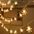 Solar powered warm white star and snowflake LED string lights for outdoor festive decor - Stars + Snowflakes (warm Colors) / Battery Steady (1.5m 10LED)