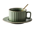 Detail of matte dark green ceramic coffee cup set with vertical stripes and golden spoon - Round-Green