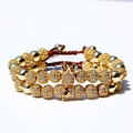Luxuriöses Gold-Perlenarmband-Set mit glänzendem Kronenanhänger auf Kordelband - Set