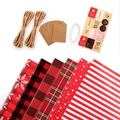 Christmas gift wrapping set with red snowflake patterns, jute twine, and kraft paper tags - 6 Sheets Wrapping Paper Set with Accessories