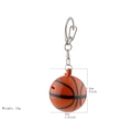 Detailed view of orange basketball keychain whistle with dimension and weight labels - Basketball Keychain
