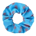 Detail of blue oversized fabric scrunchie featuring vibrant purple strawberry patterns - Lychee Blue