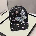 Detail of colorful rhinestones and crystal butterfly on black cotton baseball cap - Adult, Adjustable / Black