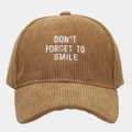Close-up detail of white embroidery on brown corduroy baseball cap showing fabric texture - One Size / Khaki
