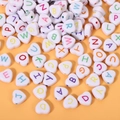 DIY white heart-shaped acrylic beads with colorful A-Z alphabet letters for jewelry - 5*10mm Outer Heart-shaped White And Colored Letters (100 Pieces)