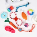 Flat lay of diverse pet toy set featuring cotton rope carrots and rubber chew rings on white - 10-Piece Set Approx 480g
