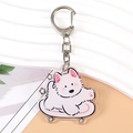 Porte-clés en acrylique chiot blanc sur skateboard avec un fermoir en métal argenté - Chien Bichon 9