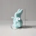 Light blue flocked Easter bunny statue with white ribbon bow decoration, 9.7cm height - Blue (Height 9.7cm)