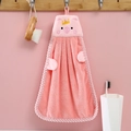 Hanging pink coral velvet hand towel featuring a cute cartoon pig with a yellow crown - Pink Pig