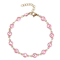 Dettaglio di ciondoli occhio rosa in smalto su un bracciale a maglie dorate con chiusura - Occhio Del Diavolo Magenta