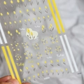 Close-up detail of KX050 3D embossed yellow tulip floral patterns on nail art stickers - KX050 Yellow Tulip