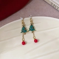 Detailed view of Christmas tree earrings with tassels and rhinestones on ceramic tray - Gold (925 Sterling Silver Earring Post) / 8# Green Oil Drop Christmas Tree (HE28538)