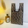 Knitted tote bag with black and khaki geometric diamond pattern and dual handles - Wavy Diamond Coffee